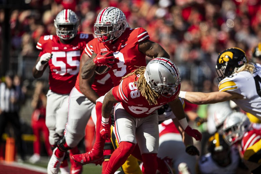 Ohio State running back Miyan Williams runs the ball for a touchdown during a football game between Iowa and No. 2 Ohio State at Ohio Stadium in Columbus, Ohio, on Saturday, Oct. 22, 2022. (Jerod Ringwald/The Daily Iowan)