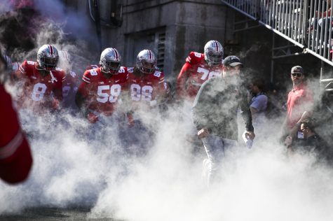 Ohio State head coach Ryan Day leads the Buckeyes onto the field during a football game between Iowa and No. 2 Ohio State at Ohio Stadium in Columbus, Ohio, on Saturday, Oct. 22, 2022. The Buckeyes defeated the Hawkeyes, 54-10.