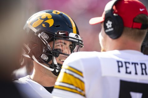 Iowa quarterback Alex Padilla interacts with his team on the sideline during a football game between Iowa and No. 2 Ohio State at Ohio Stadium in Columbus, Ohio, on Saturday, Oct. 22, 2022. Padilla saw action in a game this season for the first time. The Buckeyes defeated the Hawkeyes, 54-10.