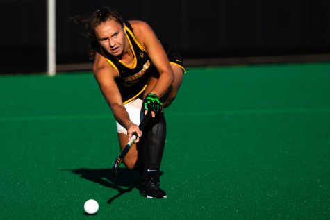 Iowa midfielder Harper Dunne hits the ball during a field hockey game between Iowa and Michigan State at Grant Field in Iowa City on Friday, Oct. 28, 2022. The Hawkeyes defeated the Spartans, 1-0.