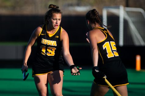 Iowa midfielder Ella Wareham celebrates with teammate Esme Gibson during a field hockey game between Iowa and Michigan State at Grant Field in Iowa City on Friday, Oct. 28, 2022. The Hawkeyes defeated the Spartans, 1-0.