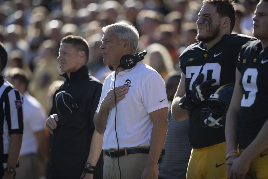 Iowa Head Coach Kirk Ferentz stands for the National Anthem during a football game between Northwestern and Iowa at Kinnick Stadium on Oct. 29, 2022. Iowa defeated Northwestern, 33-13.
