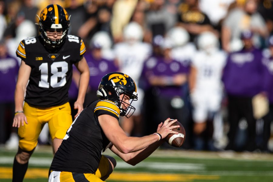 Iowa+punter+Tory+Taylor+sets+the+ball+down+for+a+field+goal+during+a+football+game+between+Iowa+and+Northwestern+at+Kinnick+Stadium+on+Saturday%2C+Oct.+29%2C+2022.+Iowa+defeated+Northwestern%2C+33-13.