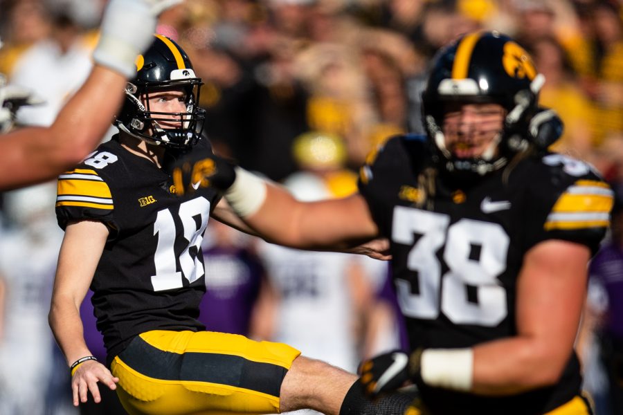 Iowa kicker Drew Stevens watches the ball after a field goal during a football game between Iowa and Northwestern at Kinnick Stadium on Saturday, Oct. 29, 2022. Iowa defeated Northwestern, 33-13.