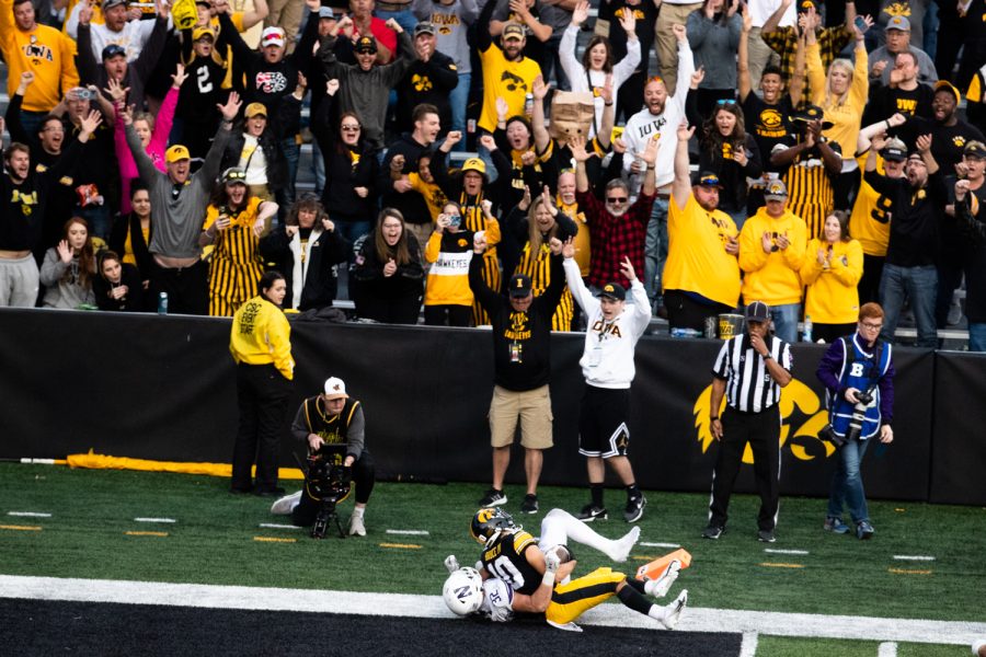 Iowa+wide+receiver+Arland+Bruce+IV+scores+a+touchdown+during+a+football+game+between+Iowa+and+Northwestern+at+Kinnick+Stadium+on+Saturday%2C+Oct.+29%2C+2022.+Iowa+defeated+Northwestern%2C+33-13.
