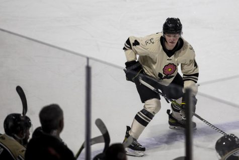 Iowa defenseman Ryan Wheeler skates during a hockey match between Iowa and Wheeling at Xtream Arena in Coralville on Wednesday, April 6, 2022. The Nailers defeated the Heartlanders, 6-4.
