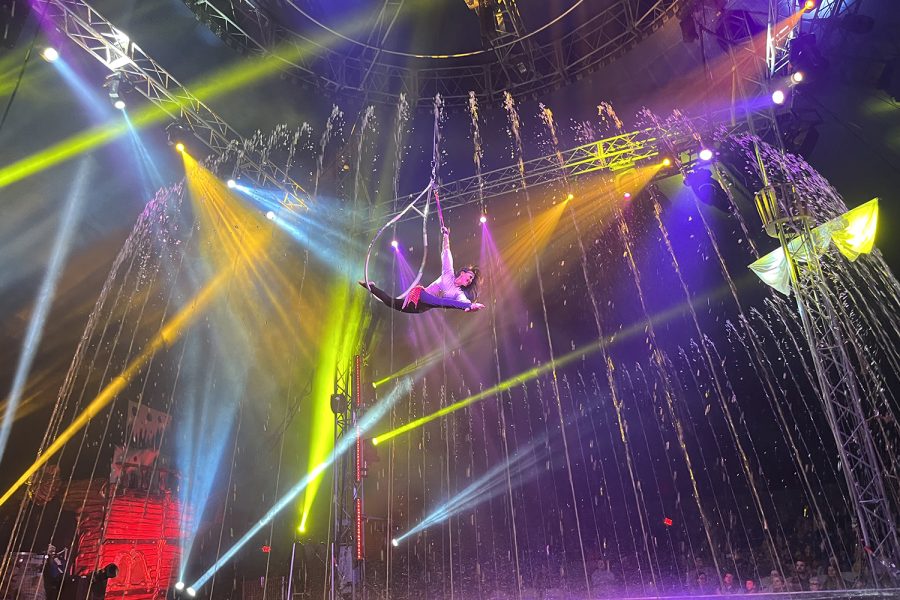 An acrobat swings across the stage during a Cirque Italia performance on Oct. 13, 2022. 