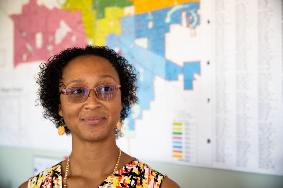 Angie Jordan, executive director of the Iowa City South District Self-Supported Municipal District, poses for a portrait in her office on Southgate Avenue in Iowa City on Tuesday, Oct. 4, 2022. Jordan has served as president of the South District Neighborhood Association for four years and currently owns Banjo Knits Empowerment. (Gabby Drees/The Daily Iowan)