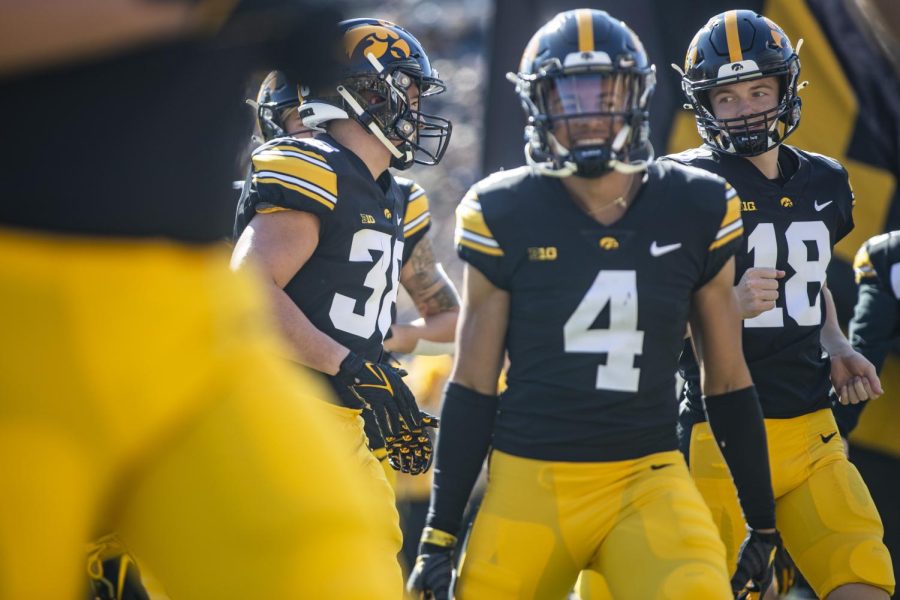 Iowa kicker Drew Stevens runs onto the field before a football game between Iowa and No. 4 Michigan at Kinnick Stadium in Iowa City on Saturday, Oct. 1, 2022. Stevens has played against Michigan, Rutgers, and Nevada. 