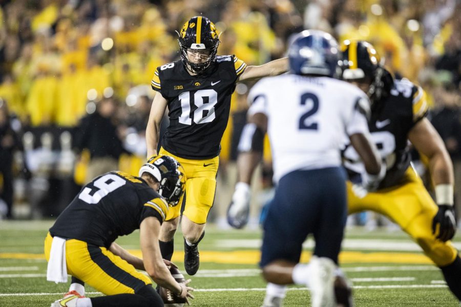 Iowa kicker Drew Stevens kicks a field goal during a near seven-hour football game between Iowa and Nevada at Kinnick Stadium in Iowa City on Saturday, Sept. 18, 2022. The Hawkeyes defeated the Wolfpack, 27-0. 
