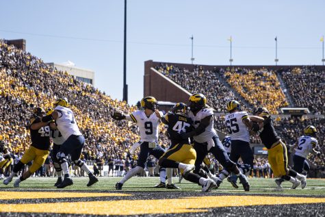 Michigan quarterback J.J. McCarthy throws a pass during a football game between Iowa and No. 4 Michigan at Kinnick Stadium in Iowa City on Saturday, Oct. 1, 2022. McCarthy averaged 6.5 yards per pass. The Wolverines defeated the Hawkeyes, 27-14.