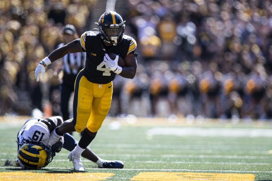 Iowa running back Leshon Williams runs the ball during a football game between Iowa and No. 4 Michigan at Kinnick Stadium in Iowa City on Saturday, Oct. 1, 2022. Williams carried the ball eight times for 34 yards. The Wolverines defeated the Hawkeyes, 27-14.