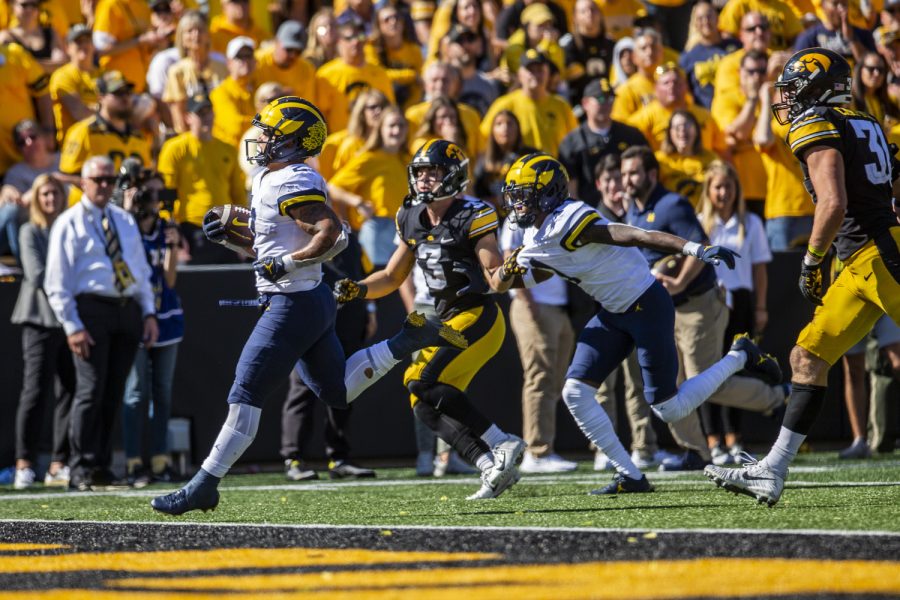 Michigan+running+back+Blake+Corum+scores+a+touchdown+during+a+football+game+between+Iowa+and+No.+4+Michigan+at+Kinnick+Stadium+in+Iowa+City+on+Saturday%2C+Oct.+1%2C+2022.+Corum+took+29+carries+for+133+yards+and+a+touchdown.+The+Wolverines+defeated+the+Hawkeyes%2C+27-14.