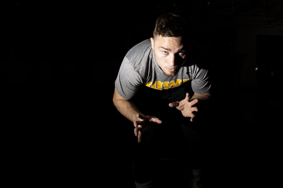 Iowa’s 125-pound Spencer Lee poses for a portrait during Iowa Wrestling Media Day in the Dan Gable Wrestling Complex at Carver-Hawkeye Arena in Iowa City on Thursday, Oct. 27, 2022. Lee is a three-time NCAA Champion and a two-time Big Ten Champion. The University of Iowa announced at the end of 2021 that Lee would undergo ACL surgery to repair his two torn ACLs, ending his 2021-22 season.