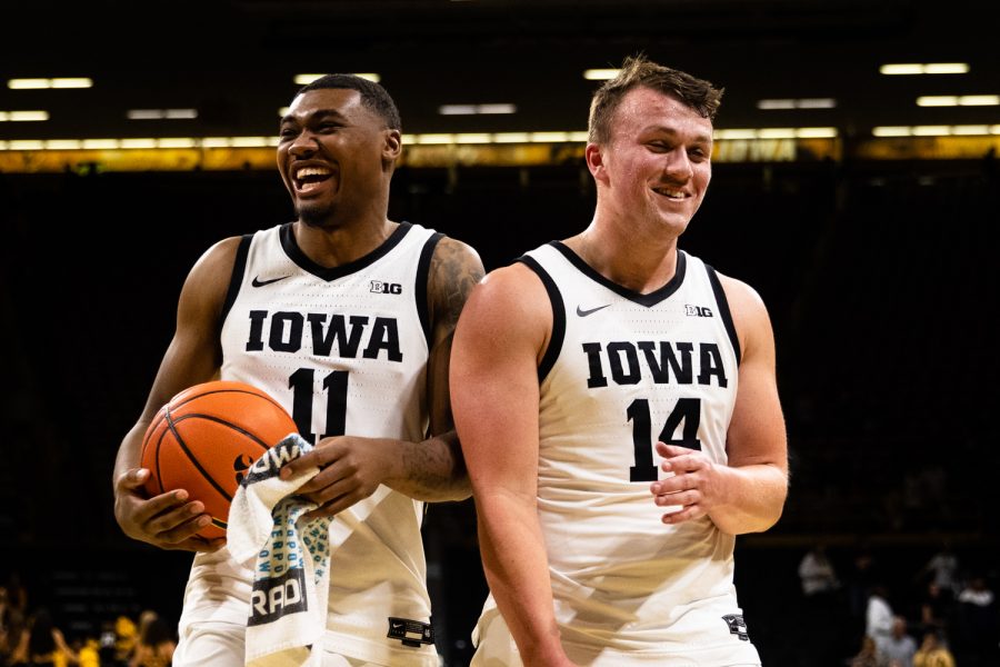 Iowa guard Tony Perkins and guard Carter Kingsbury laugh after a mens exhibition basketball game between Iowa and Truman State at Carver-Hawkeye Arena in Iowa City on Monday, Oct. 31, 2022. Iowa defeated Truman State, 118-72.