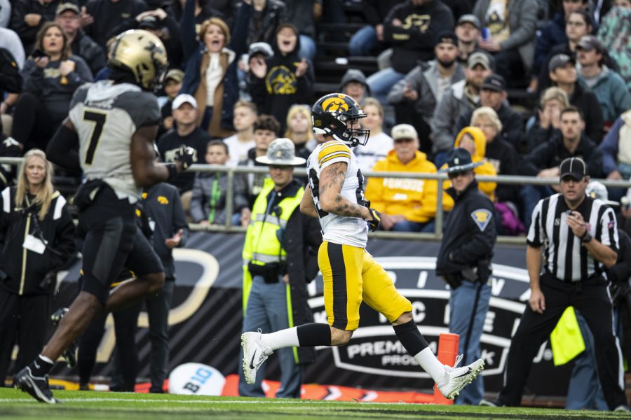 Iowa wide receiver Nico Ragaini (89) carries the ball into the end zone for a touchdown during a football game between Iowa and Purdue at Ross-Ade Stadium in West Lafayette, Ind., on Saturday, Nov. 5, 2022.