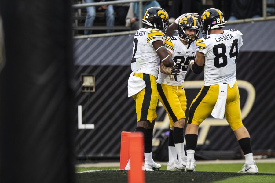 Iowa+Hawkeyes+wide+receiver+Nico+Ragaini+%2889%29+celebrates+a+touchdown+with+tight+end+Sam+LaPorta+%2884%29+and+running+back+Kaleb+Johnson+%282%29+during+a+football+game+between+Iowa+and+Purdue+at+Ross-Ade+Stadium+in+West+Lafayette%2C+Ind.%2C+on+Saturday%2C+Nov.+5%2C+2022.+Ragaini+picked+up+56+yards+and+a+touchdown.+The+Hawkeyes+defeated+the+Boilermakers%2C+24-3.