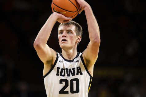 Iowa guard Payton Sandfort shoots a 3-pointer during a men’s basketball game between Iowa and Bethune-Cookman at Carver-Hawkeye Arena in Iowa City on Monday, Nov. 7, 2022. Sandfort shot 3-of-9 in 3-pointers. The Hawkeyes defeated the Wildcats, 89-58. 