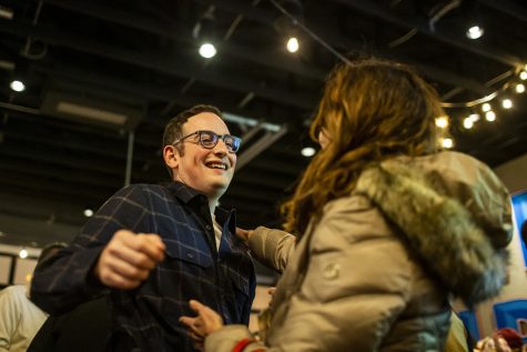 Iowa House District 90 seat Adam Zabner hugs a supporter during a watch party on Election Day at Big Grove Brewery and Taproom in Iowa City, on Tuesday, Nov. 8, 2022. Adam Zabner won the election for District 90 on Tuesday after running unopposed.