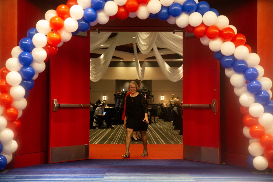 Rep. Mariannette Miller-Meeks, R-Iowa walks out of the room during a watch party at Rhythm Casino in Davenport Iowa Tuesday, Nov. 8, 2022. 