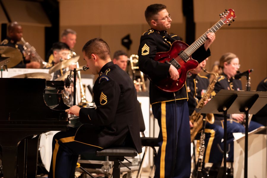Pianist Staff Sergeant Anthony Pocetti and Guitarist Sergeant First Class Johnathan Epley perform during The United States Army Field Band “Jazz Ambassadors” Big Band concert in the Voxman Concert Hall Thursday Nov. 10, 2022.