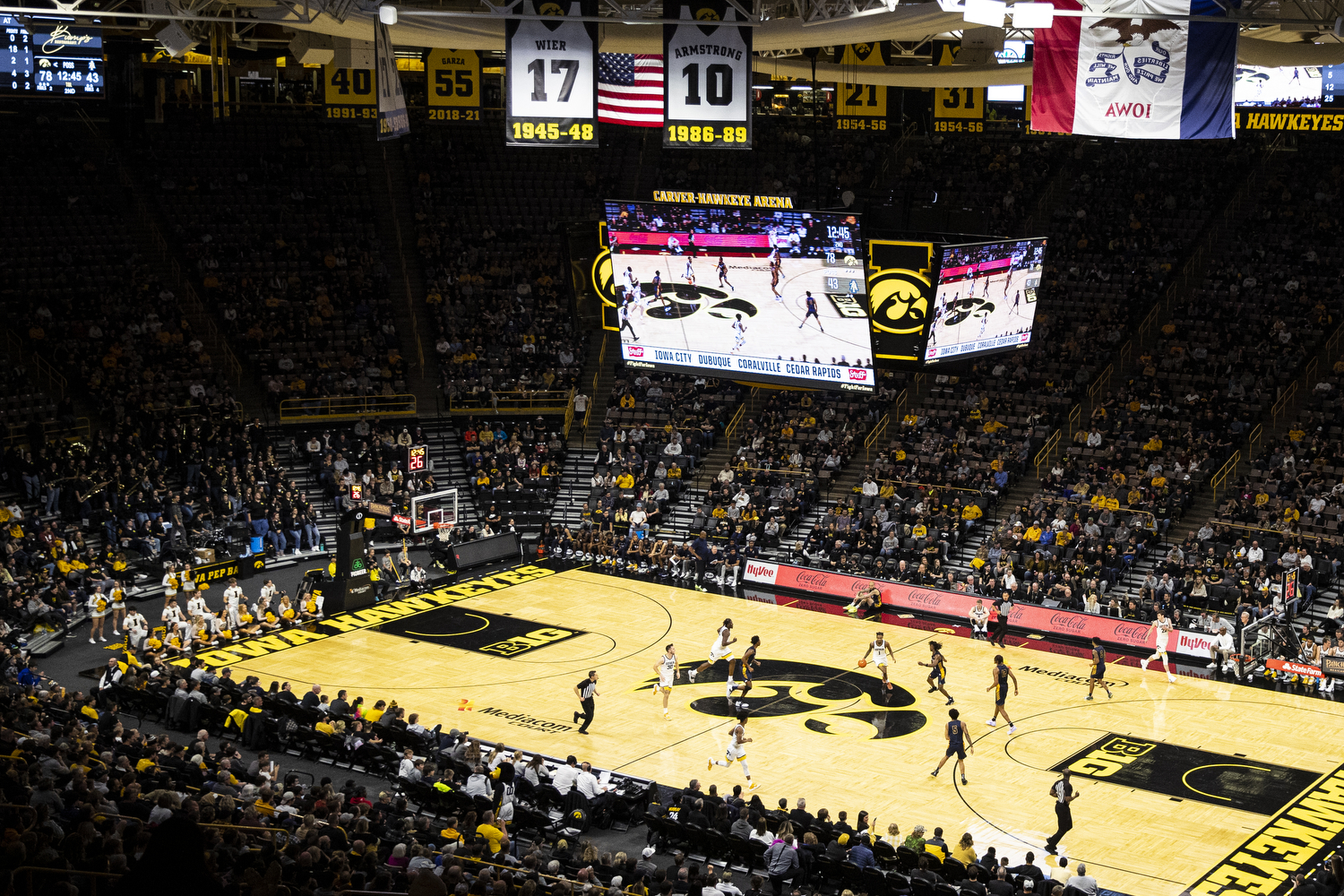 Iowa basketball player suspended for a game after being charged in bar  fight