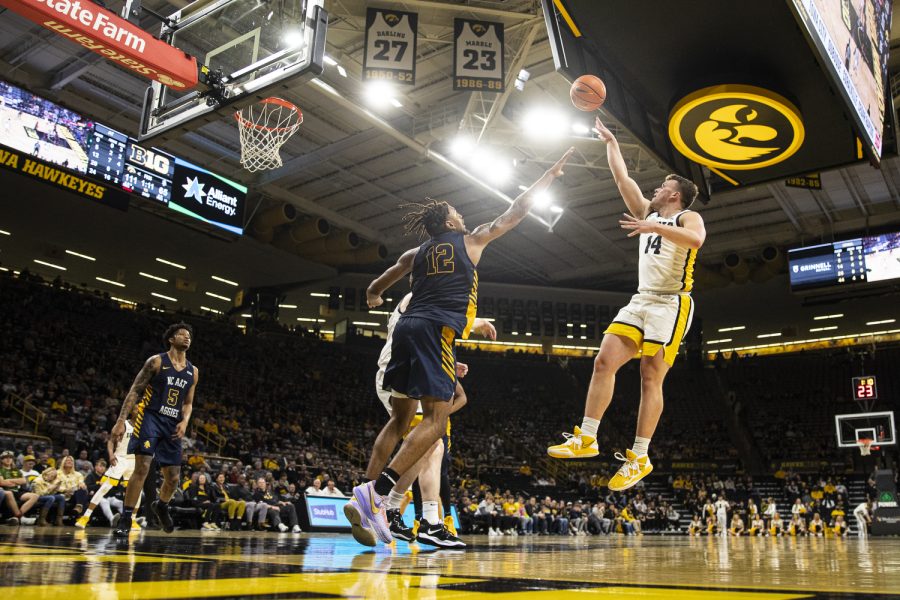 Iowa guard Carter Kingsbury puts up a shot during a mens basketball game between Iowa and North Carolina A&T at Carver-Hawkeye Arena in Iowa City on Friday, Nov. 11, 2022. Kingsbury scored four points in the game. The Hawkeyes defeated the Aggies, 112-71.