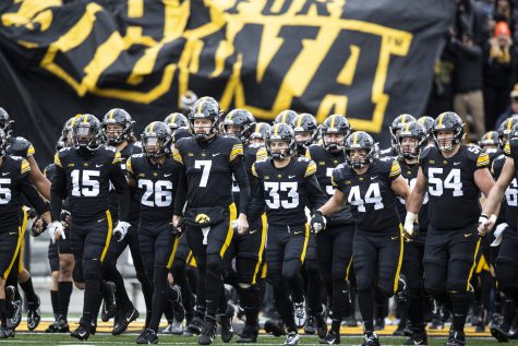 The Hawkeyes take the field during a football game between Iowa and Wisconsin at Kinnick Stadium on Saturday, Nov. 12, 2022. Wisconsin led the historic rivalry entering the game, 49-44, and won the previous matchup in Madison last year. The Hawkeyes defeated the Badgers, 24-10.