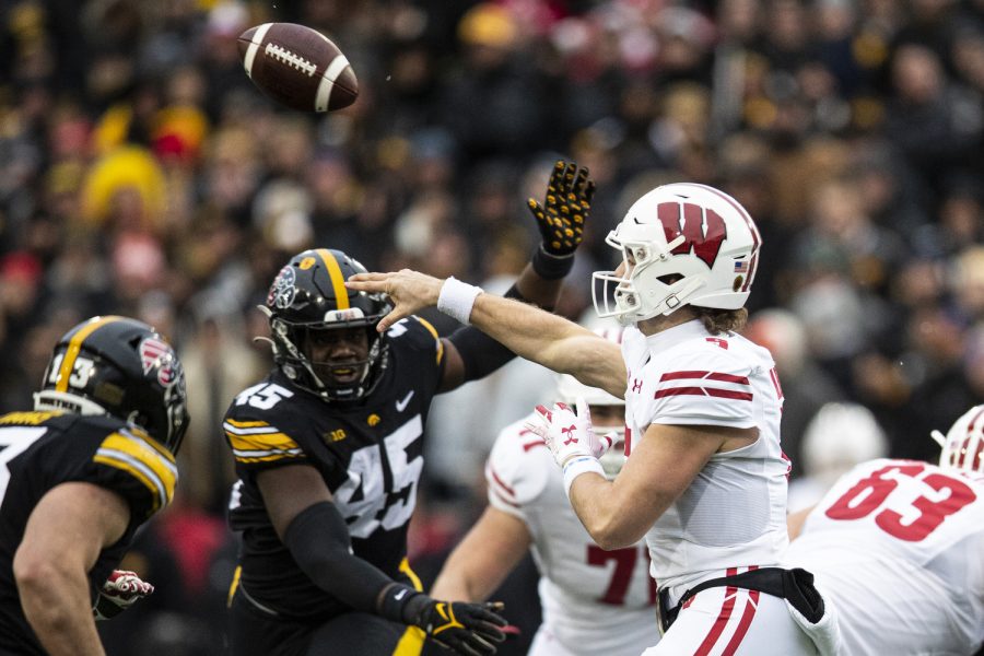 Wisconsin quarterback Graham Mertz throws a pass during a football game between Iowa and Wisconsin at Kinnick Stadium on Saturday, Nov. 12, 2022. Mertz threw for 16 completions on 35 attempts. The Hawkeyes defeated the Badgers, 24-10.