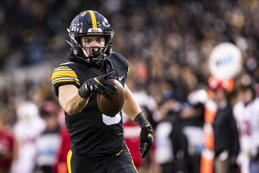 Iowa+defensive+back+Cooper+DeJean+returns+a+pick+six+during+a+football+game+between+Iowa+and+Wisconsin+at+Kinnick+Stadium+in+Iowa+City+on+Saturday%2C+Nov.+12%2C+2022.+DeJean+had+10+tackles+and+an+interception.+The+Hawkeyes%2C+defeated+the+Badgers%2C+24-10.