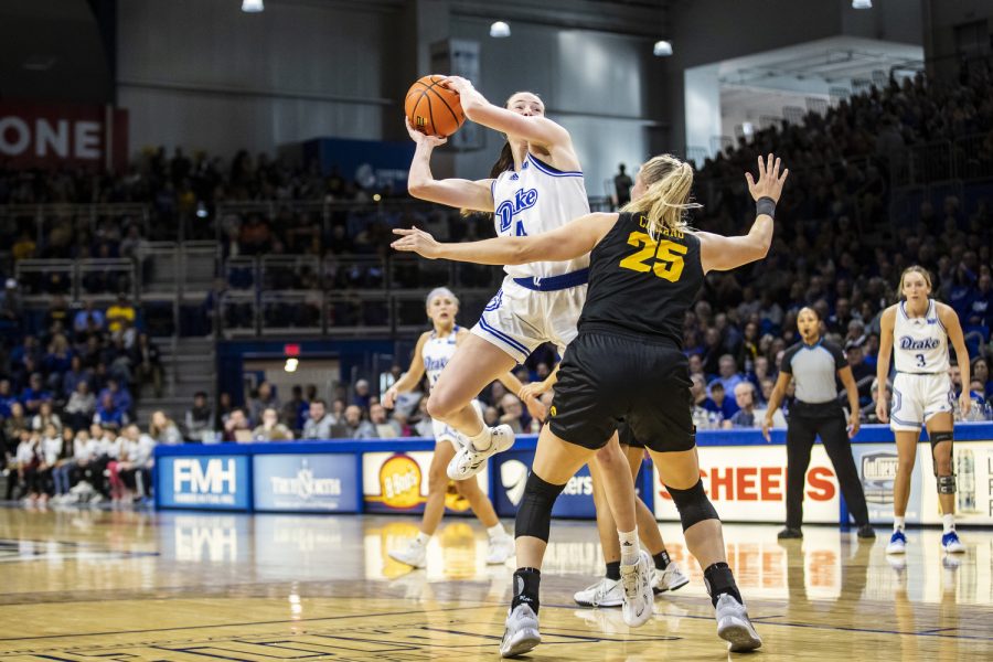 Drake forward Anna Miller goes up for a shot during a basketball game between Iowa and Drake at the Knapp Center in Des Moines, Iowa, on Sunday, Nov. 13, 2022. Miller played for 21 minutes and eight seconds. The Hawkeyes defeated the Bulldogs in overtime, 92-86. 