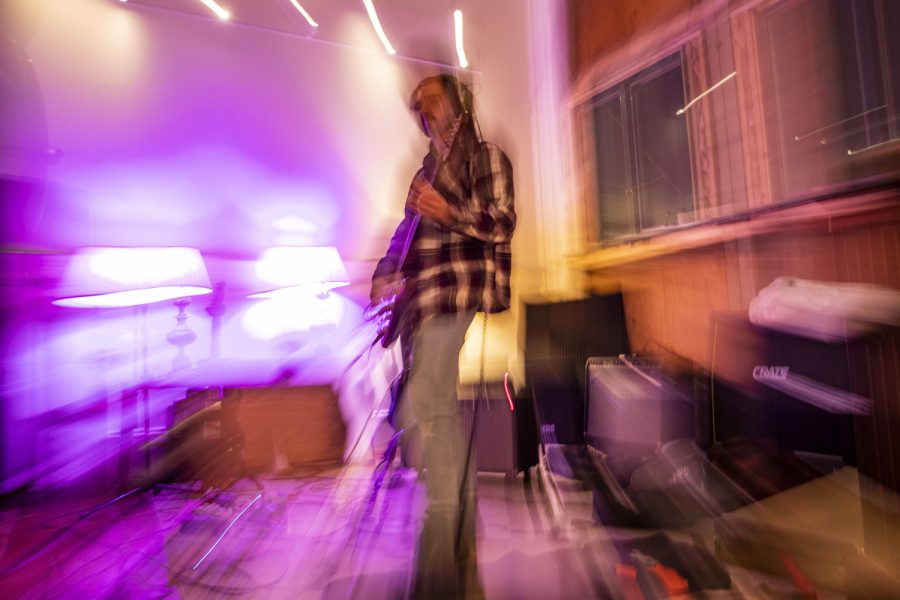 Garrett Hinson, lead guitarist of Part Time Vegan, plays his guitar at The Vault, a music studio in West Liberty, Iowa, on Thursday, Nov. 17, 2022. Part Time Vegan started in the fall of 2020 and had its first show in July 2021. 