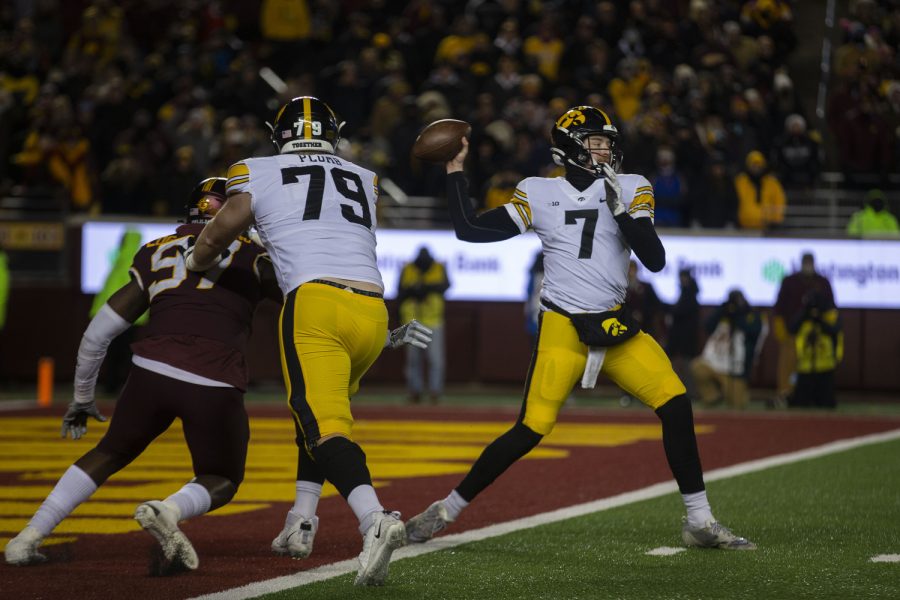 Iowa quarterback Spencer Petras throws a pass during a football game between Iowa and Minnesota at Huntington Bank Stadium in Minneapolis on Saturday, Nov. 19, 2022. Petras passed for 221 yards on 15 completions. The Hawkeyes defeated the Gophers, 13-10.