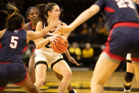 Iowa guard Caitlin Clark brings the ball down the court during a women’s basketball game between Iowa and Belmont at Carver Hawkeyes Arena in Iowa City on Sunday Nov. 20, 2022. The Hawkeyes defeated the Bruins 73-62.