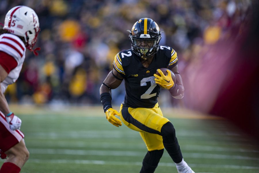 Iowa running back Kaleb Johnson carries the ball during a football game between Iowa and Nebraska at Kinnick Stadium on Friday, Nov. 25, 2022. The Huskers lead the Hawkeyes at halftime, 17-0. (Ayrton Breckenridge/The Daily Iowan)