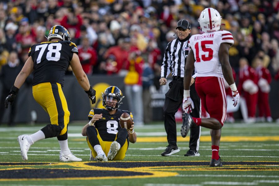 Iowa+quarterback+Alex+Padilla+gets+up+with+the+help+of+Iowa+offensive+lineman+Mason+Richman+after+getting+sacked+during+a+football+game+between+Iowa+and+Nebraska+at+Kinnick+Stadium+on+Friday%2C+Nov.+25%2C+2022.+The+Huskers+lead+the+Hawkeyes+at+halftime%2C+17-0.