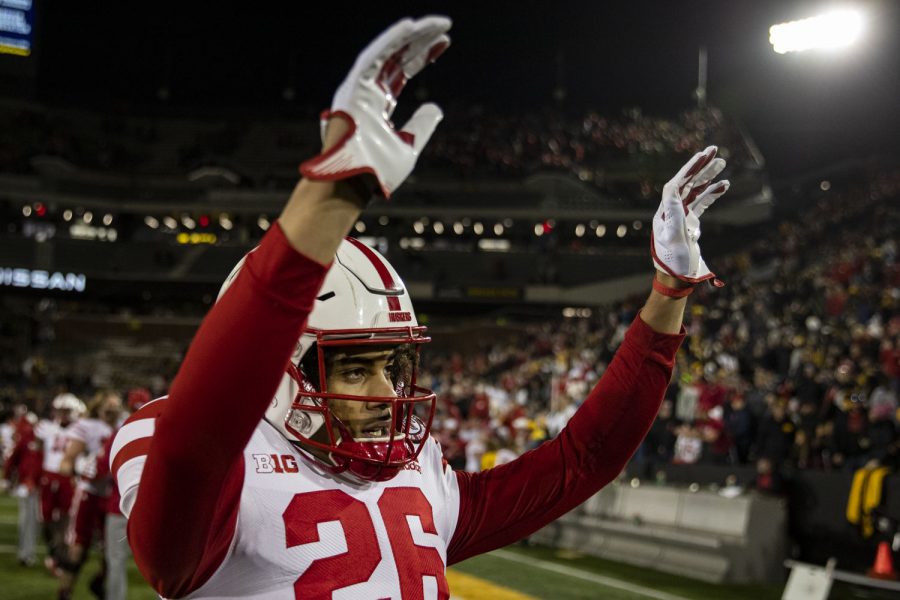 Nebraska defensive back Koby Bretz waves to the crowd after a football game between Iowa and Nebraska at Kinnick Stadium on Friday, Nov. 25, 2022. The Huskers defeated the Hawkeyes, 24-17. 