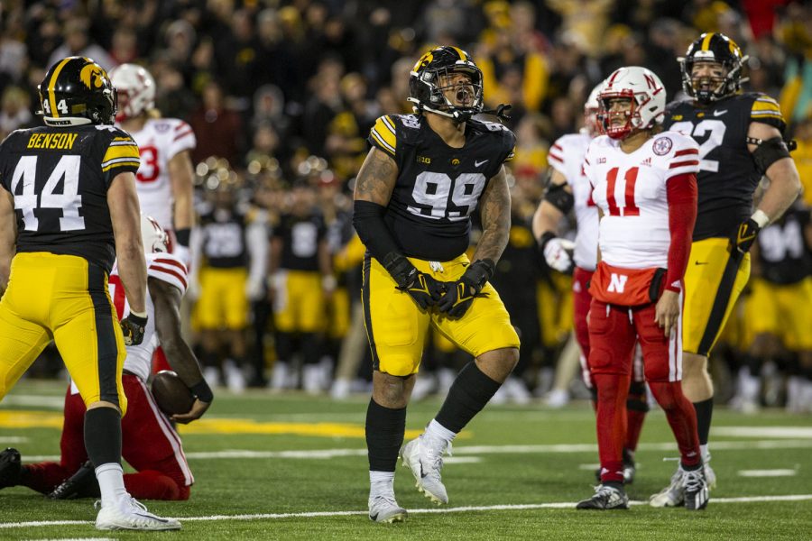 Iowa defensive lineman Noah Shannon celebrates after tackling Nebraska running back Anthony Grant for a loss during a football game between Iowa and Nebraska at Kinnick Stadium on Friday, Nov. 25, 2022. The Huskers defeated the Hawkeyes, 24-17.