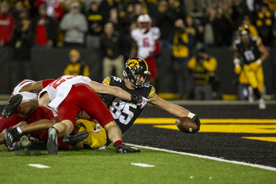 Iowa tight end Luke Lachey lunges for a touchdown during a football game between Iowa and Nebraska at Kinnick Stadium on Friday, Nov. 25, 2022. Lachey had seven catches 89 yards. The Huskers defeated the Hawkeyes, 24-17.