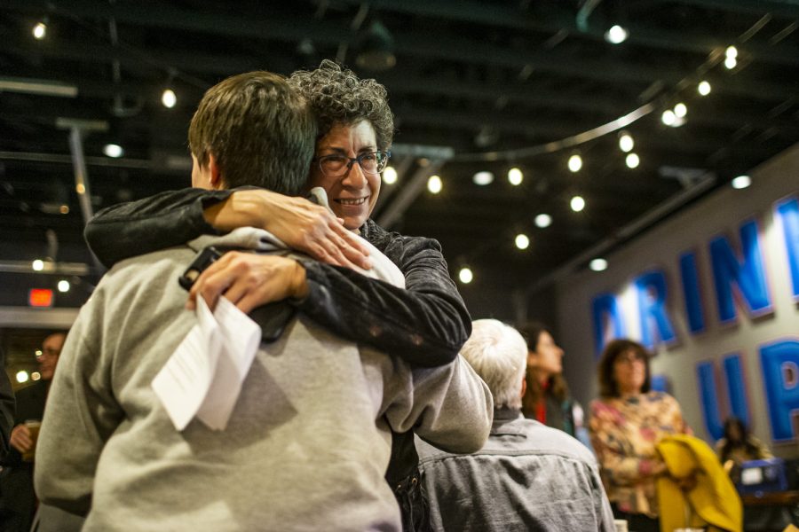 Iowa Senate District 45 seat Janice Weiner hugs her daughter, Lia Weiner, during a watch party on Election Day at Big Grove Brewery & Taproom in Iowa City, on Tuesday, Nov. 8, 2022.