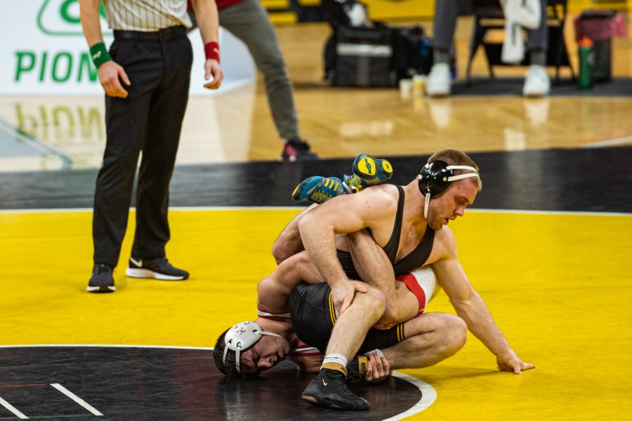 Iowa%E2%80%99s+174-pound+Patrick+Kennedy+grapples+with+Nebraska%E2%80%99s+Mikey+Labriola+during+a+wrestling+dual+meet+between+No.+1+Iowa+and+No.+6+Nebraska+at+Carver+Hawkeye+Arena+on+Friday%2C+Jan.+15%2C+2021.+No.+4+Labriola+defeated+Kennedy+by+decision%2C+7-4%2C+and+the+Hawkeyes+defeated+the+Cornhuskers%2C+31-6.