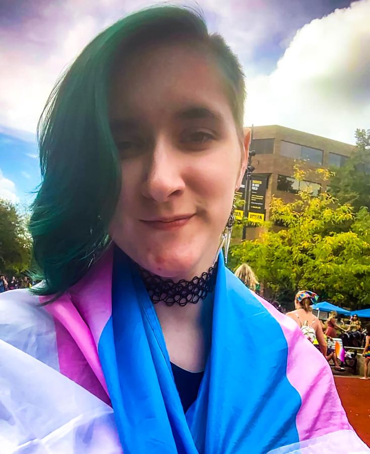 Simon Reichel attended the transgender rights protest in Iowa City on March 11. Reichel came out as a transgender male at age 15 and experienced verbal abuse from their family. (Contributed photo of Simon Reichel)