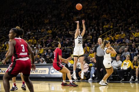 Iowa guard Caitlin Clark shoots a 3-pointer during a women’s basketball game between No. 10 Iowa and No. 12 NC State at Carver-Hawkeye Arena in Iowa City on Thursday, Dec. 1, 2022. Clark shot 5-of-13 in 3-pointers. 
