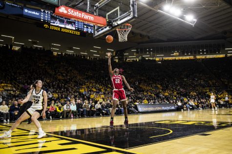 NC State guard Saniya Rivers goes up for a shot during a women’s basketball game between No. 10 Iowa and No. 12 NC State at Carver-Hawkeye Arena in Iowa City on Thursday, Dec. 1, 2022. Rivers shot 9-of-11 in field goals. Both Rivers and guard Diamond Johnson scored 22 points for NC State. The Wolfpack defeated the Hawkeyes, 94-81. 