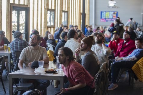 Patrons react to the U.S. versus Netherlands soccer match at a 2022 World Cup watch party held by Big Grove Brewery and Taproom in Iowa City on Dec. 3, 2022.