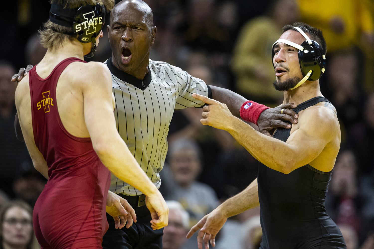 Point/Counterpoint Will Iowa or Iowa State win the CyHawk wrestling