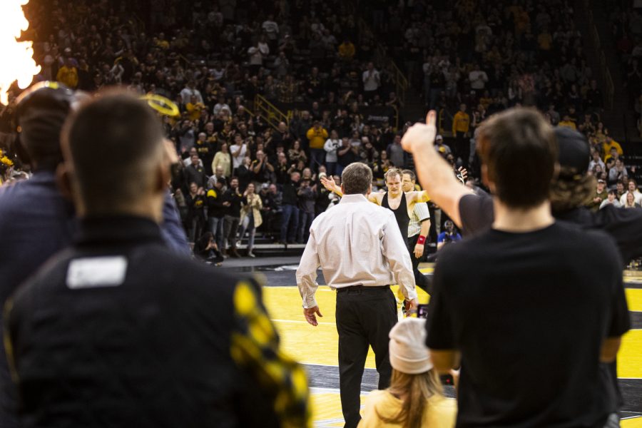 Iowa%E2%80%99s+No.+19+174-pound+Nelson+Brands+celebrates+a+win+over+Iowa+States+No.+23+174-pound+Julien+Brodersen+during+a+wrestling+meet+between+No.+2+Iowa+and+No.+7+Iowa+State+at+Carver-Hawkeye+Arena+in+Iowa+City+on+Sunday%2C+Dec.+4%2C+2022.+Brands+defeated+Brodersen%2C+13-5.+The+Hawkeyes+defeated+the+Cyclones%2C+18-15.+