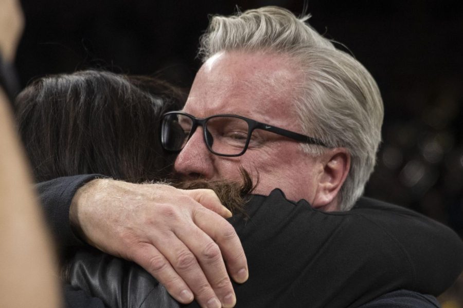 Iowa head coach Fran McCaffery hugs his wife Margaret after a win over Iowa State at Carver-Hawkeye Arena. in Iowa City on Dec. 8, 2022. The Hawkeyes defeated the Cyclones, 75-56. McCaffery recorded his 500th career win as a head coach.