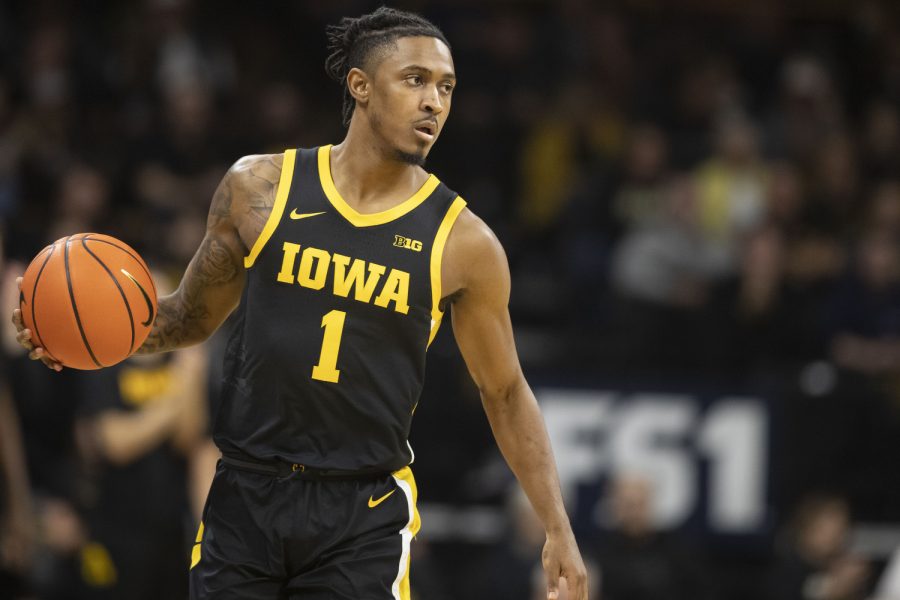 Iowa+guard+Ahron+Ulis+dribbles+the+ball+during+a+basketball+game+Iowa+and+Iowa+State+at+Carver-Hawkeye+Arena+in+Iowa+City+on+Dec.+8%2C+2022.+The+Hawkeyes+defeated+the+Cyclones%2C+75-56.+Ulis+scored+eight+points+and+collected+seven+rebounds.