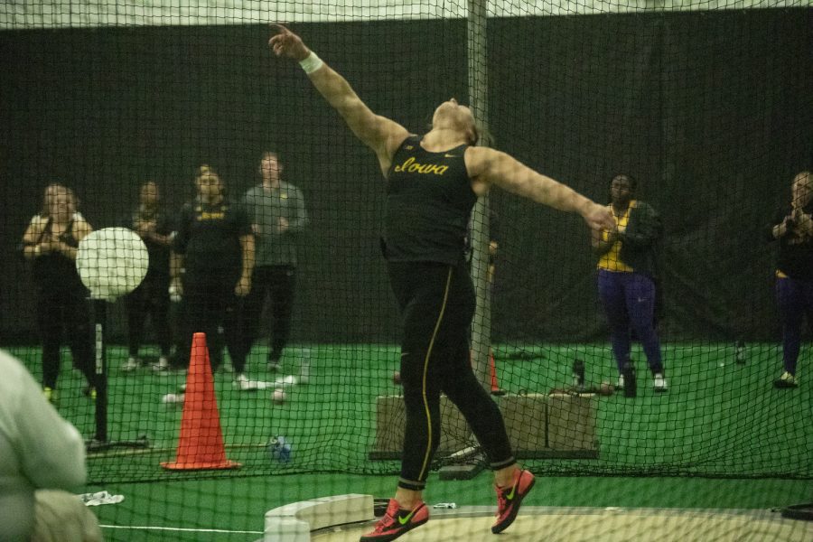Iowa’s Jamie Kofron holds her release during the Jimmy Grant Invitational track meet at the Hawkeye Tennis and Recreation Complex in Iowa City on Saturday December 10th, 2022. Kofron placed seventh with a furthest throw at a distance of 14.34m during the indoor shot-put event.